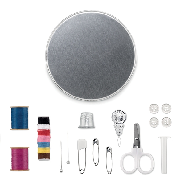 Aluminium tin ● 2 Small Threads ● 1 Medium Thread ● 3 Safety Pins ● Thumble ● 2 Pins ● Scissors ● 4 Buttons ● Needle Threader ●Needle Holder (incl 2 needles inside).